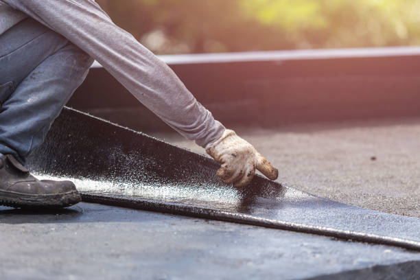 Professional Exterior Waterproofing technician working in Elkhart, KS